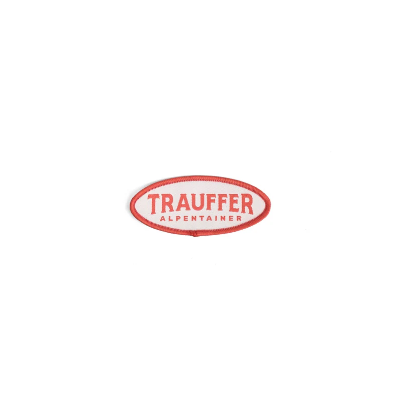 Badge Trauffer Schrift