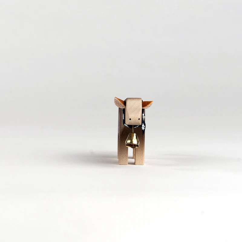Kalb mit Glocke Braunvieh