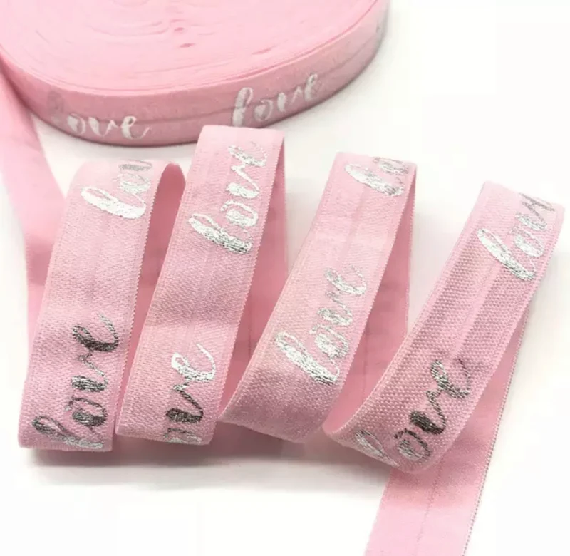 Gummiband Haarband Armband Love silber auf rosa