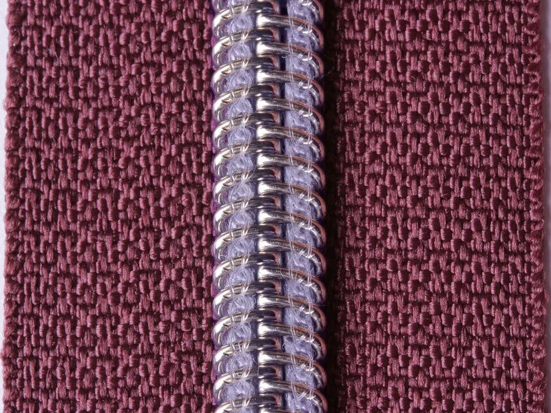 Endlos-Reißverschluss metallisierter Reißverschluss silber braun