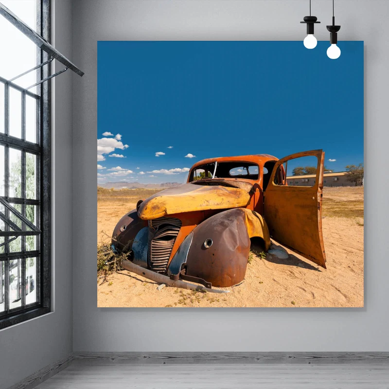 Spannrahmenbild Verlassener Oldtimer in Wüstenlandschaft Quadrat