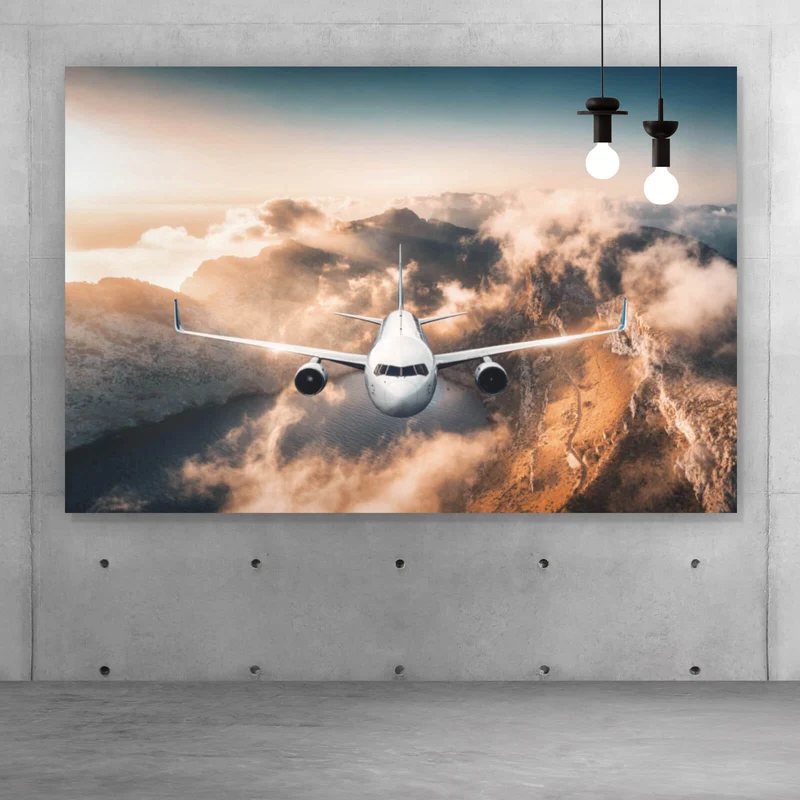 Aluminiumbild Flugzeug über beeindruckender Berglandschaft Querformat