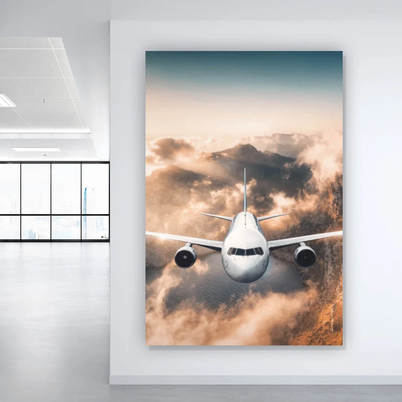 Spannrahmenbild Flugzeug über beeindruckender Berglandschaft Hochformat