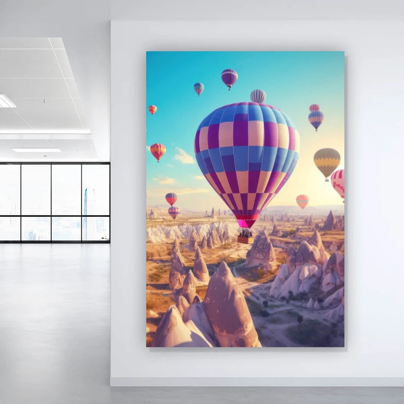 Leinwandbild Eindrucksvolle Ballonfahrt über Landschaft Hochformat