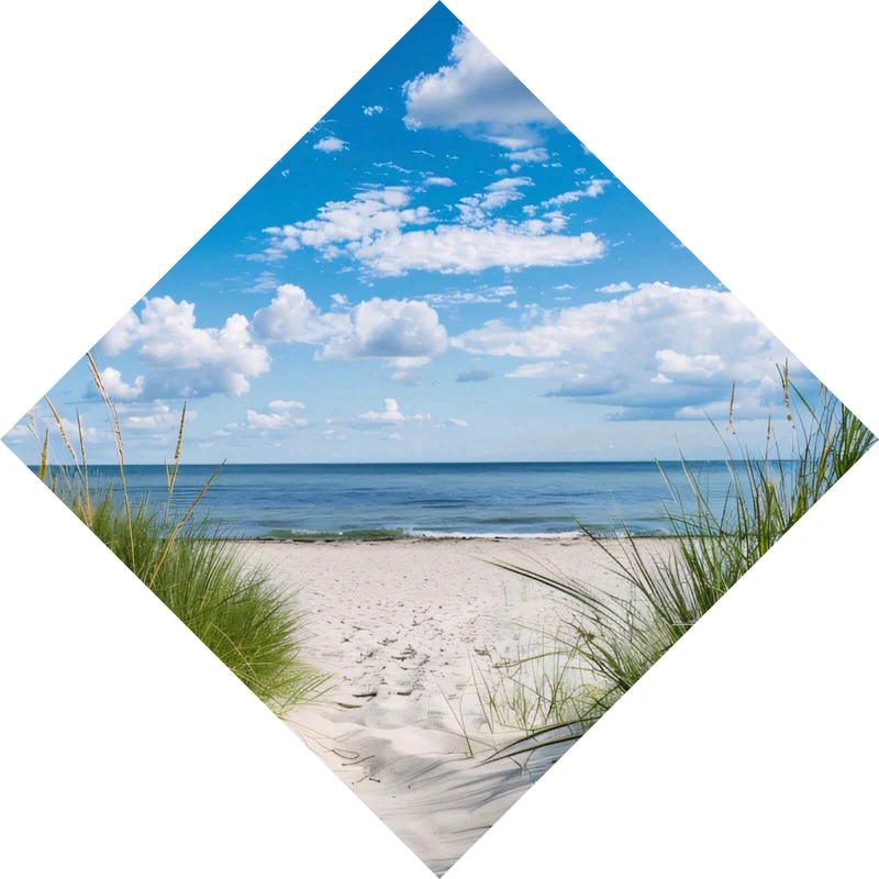 Leinwandbild Strand mit beruhigendem Meerblick Raute