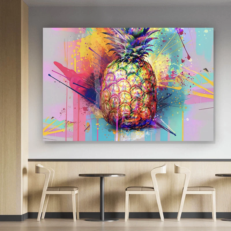 Spannrahmenbild Bunte Ananas mit knalligen Farbspritzer Hintergrund Querformat