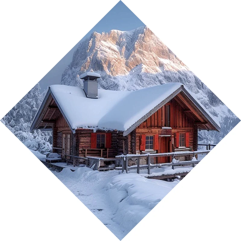 Spannrahmenbild Berghütte in verschneiter Alpenlandschaft bei Sonnenaufgang Raute