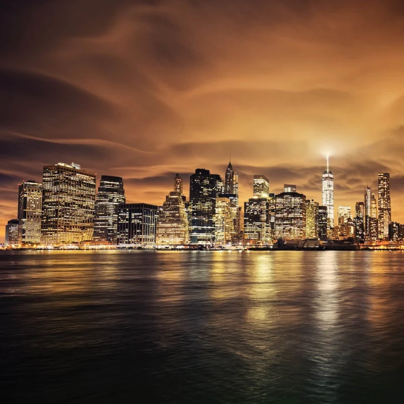 Spannrahmenbild Manhattan bei Sonnenuntergang Quadrat