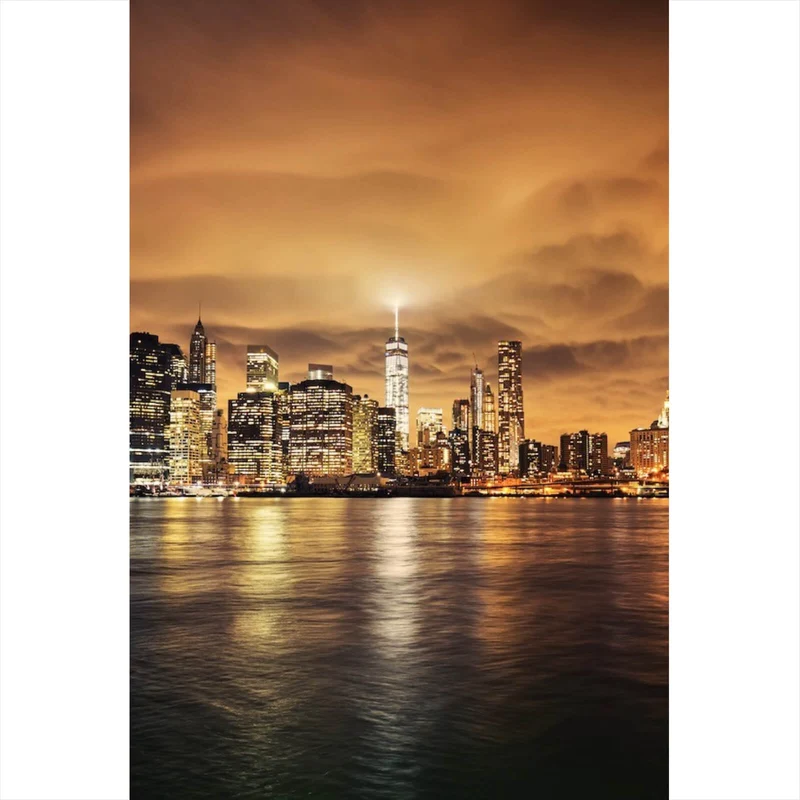 Spannrahmenbild Manhattan bei Sonnenuntergang Hochformat