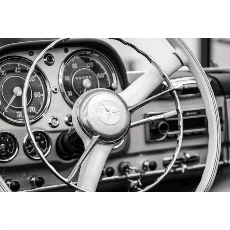 Spannrahmenbild Klassisches Lenkrad und Armaturenbrett eines Oldtimers Querformat