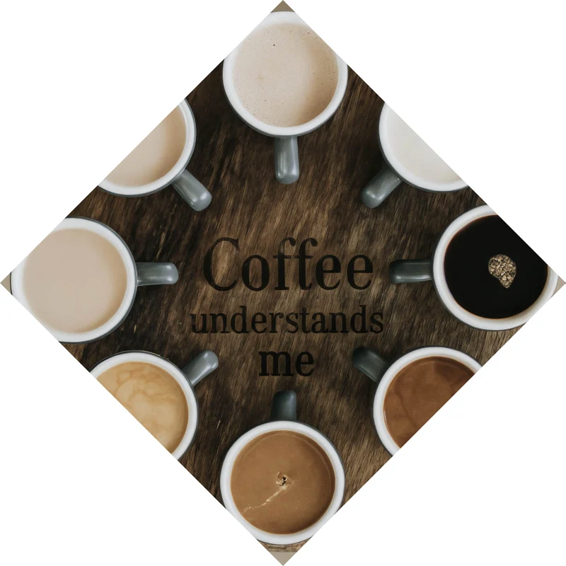 Aluminiumbild gebürstet Verschiedene Kaffeesorten auf einem Tablett serviert Raute
