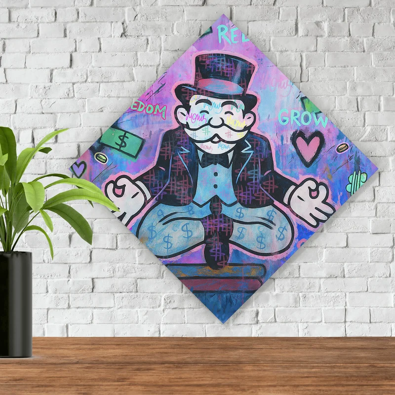 Leinwandbild Meditierende Spielfigur mit Geld und motivierenden Sprüchen Raute