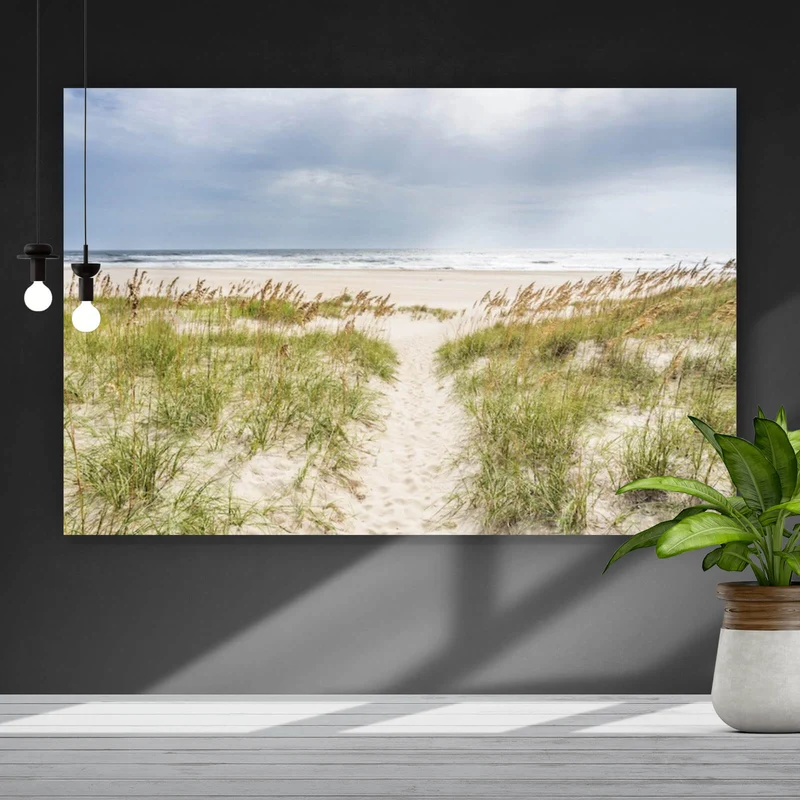 Spannrahmenbild Strandweg zwischen Dünen unter wolkigem Himmel Querformat