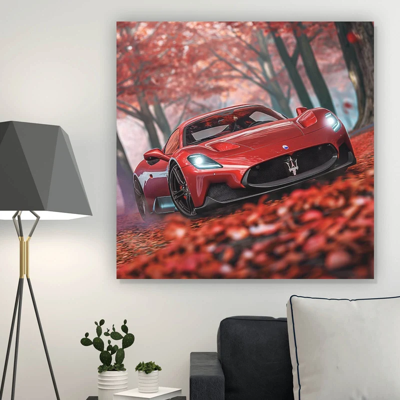 Spannrahmenbild Roter Sportwagen fährt durch herbstlichen Wald No.2 Quadrat