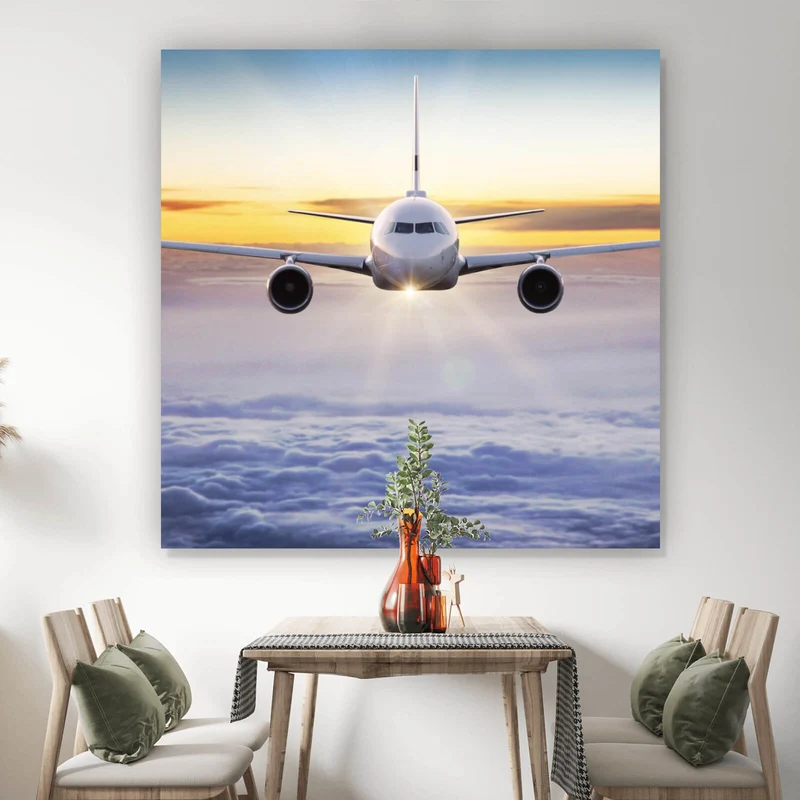 Spannrahmenbild Flugzeug fliegt über den Wolken Quadrat