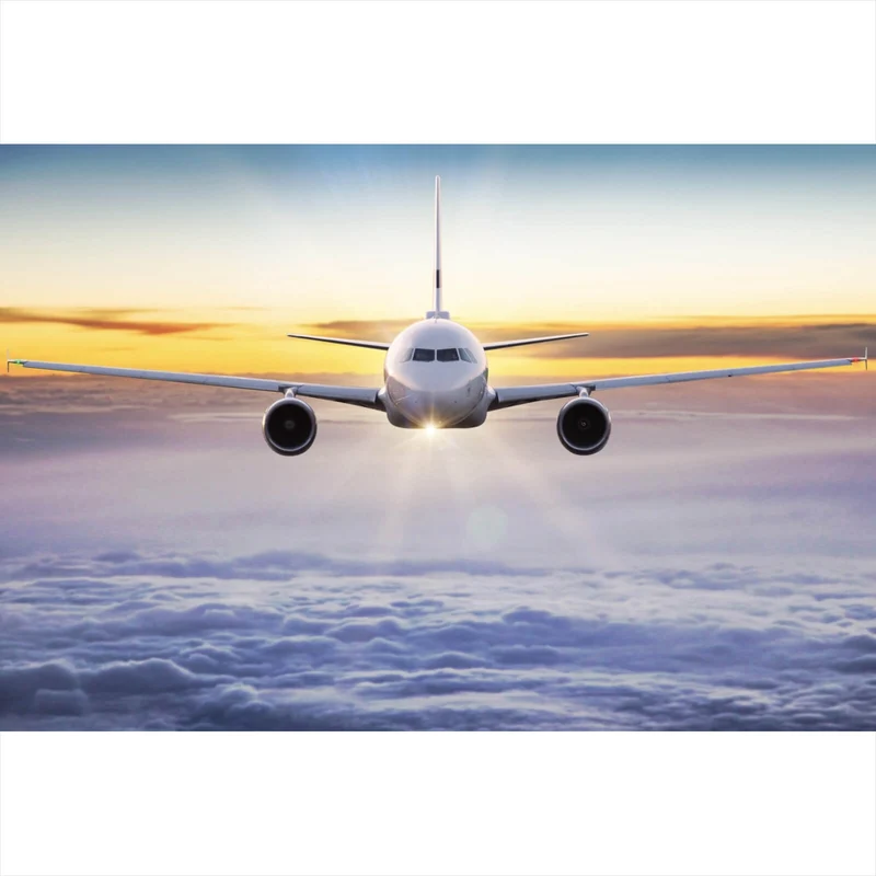 Spannrahmenbild Flugzeug fliegt über den Wolken Querformat