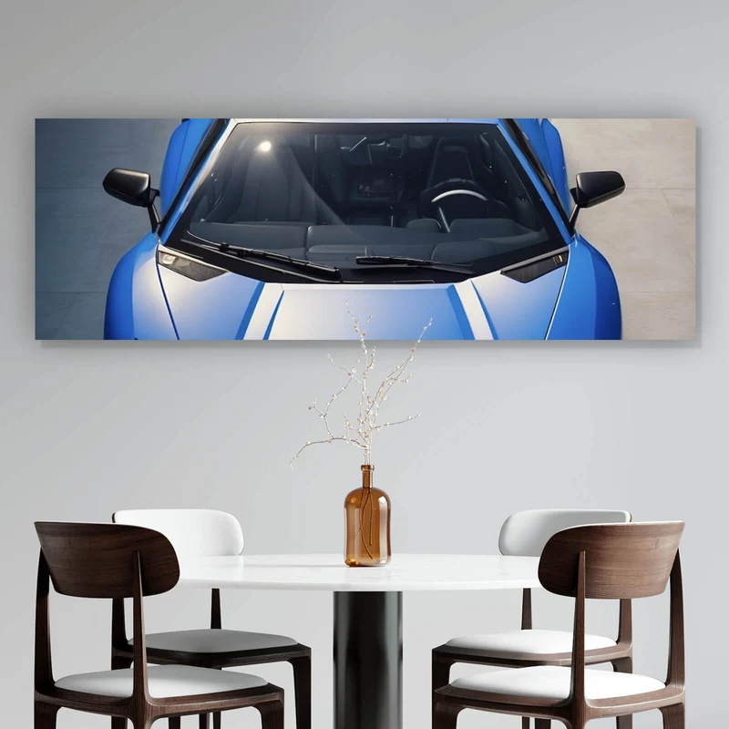 Leinwandbild Blauer Sportwagen in Frontansicht geparkt Panorama