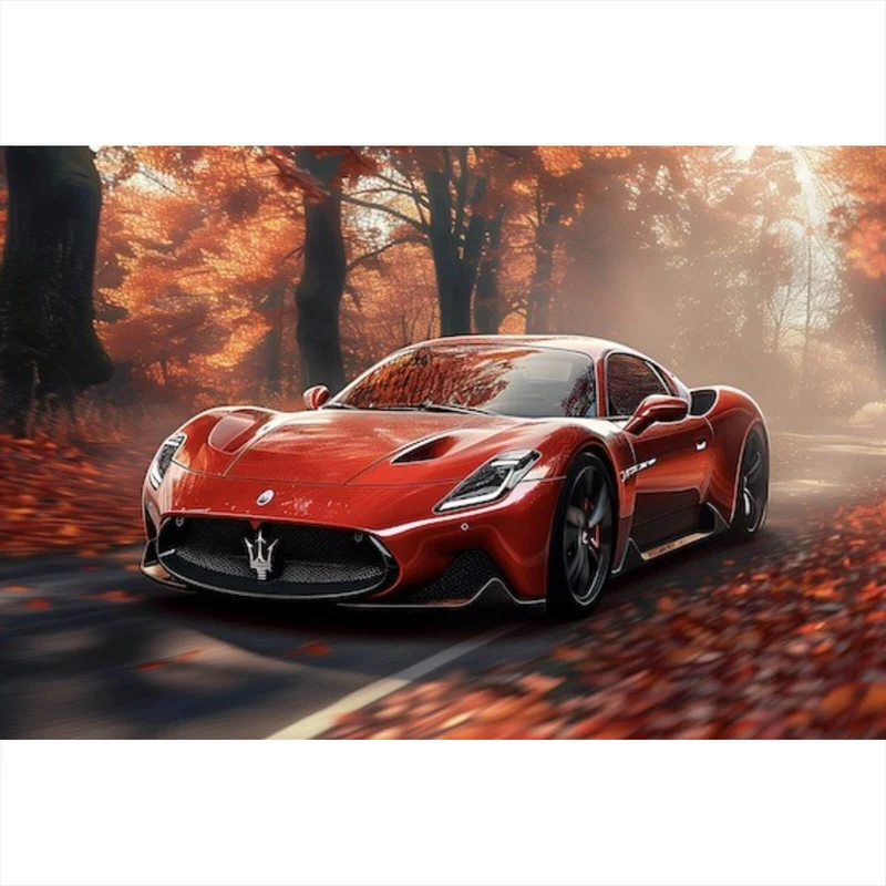 Aluminiumbild Roter Sportwagen fährt durch herbstlichen Wald Querformat