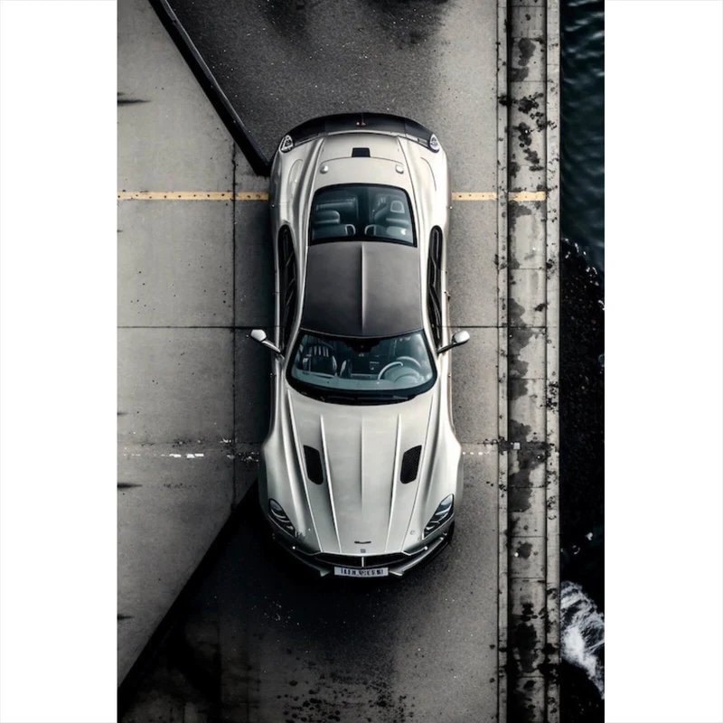 Leinwandbild Elegantes Auto auf Brücke mit Wasser im Hintergrund Hochformat