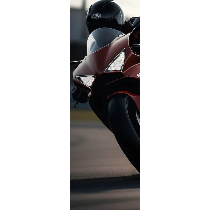 Leinwandbild Motorradfahrer in dynamischer Kurvenfahrt Panorama Hoch
