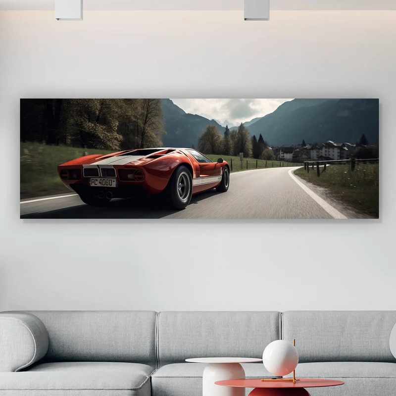 Acrylglasbild Roter Sportwagen auf kurviger Bergstraße Panorama