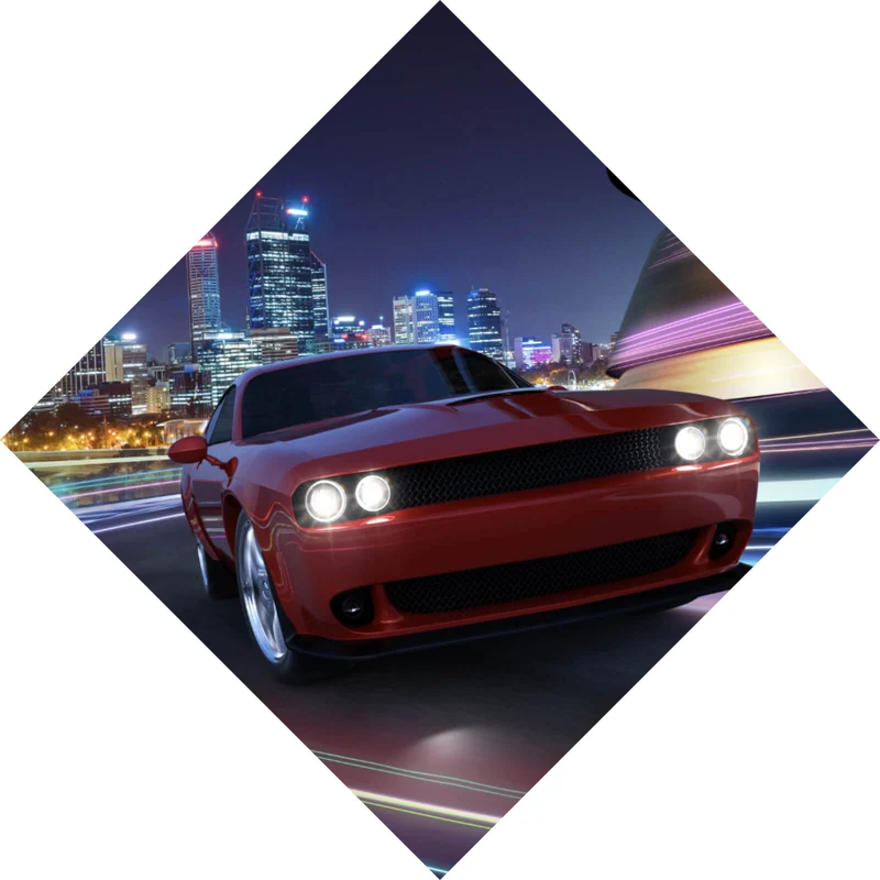 Leinwandbild Muscle Car in der Stadt bei Nacht Raute